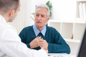 senior patient with doctor