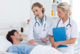 two doctors talk about payment with a man who does not have insurance