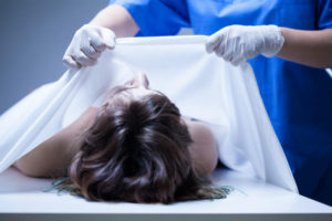 Doctor performing autopsy