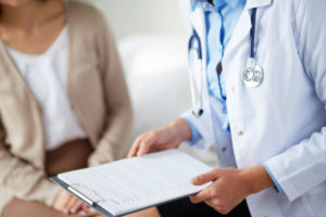doctor speaking with patient