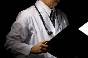 doctor looking at a chart