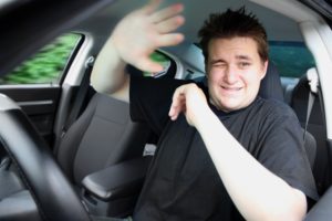 Driver not wearing seatbelt about to get accident.