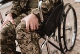 Disabled veteran sitting on his wheelchair.