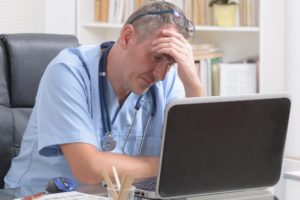 Depressed doctor worried over medical malpractice.