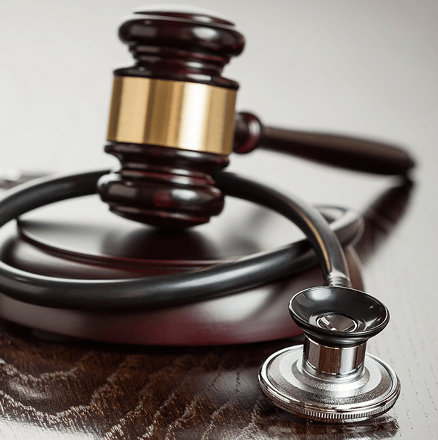 Photograph of gavel and stethoscope