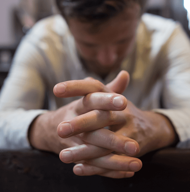 photograph of man praying to reflect religious rights
