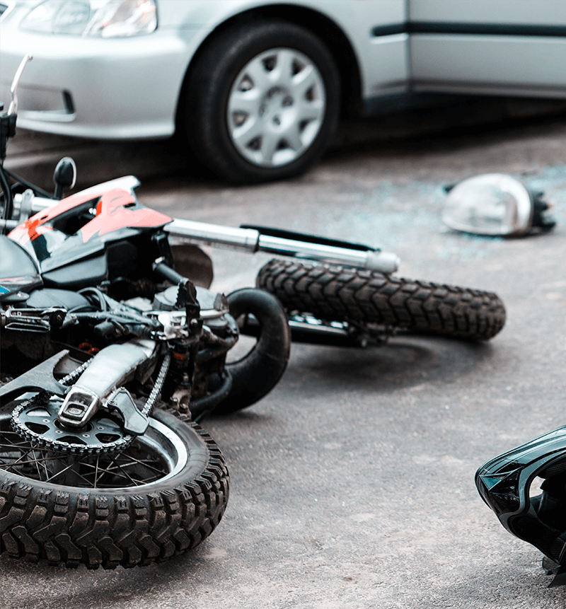 Photograph of motorcycle and car accident